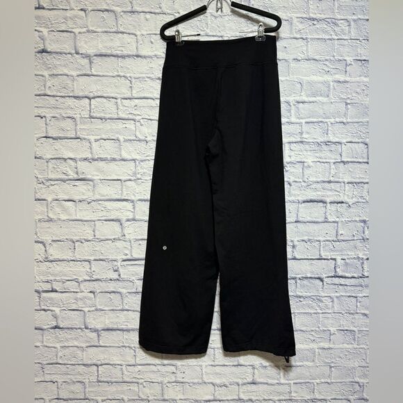 Lululemon Sit In Stillness Pant
Black wide leg drawstring bottom ankles size 10 - Picture 1 of 16